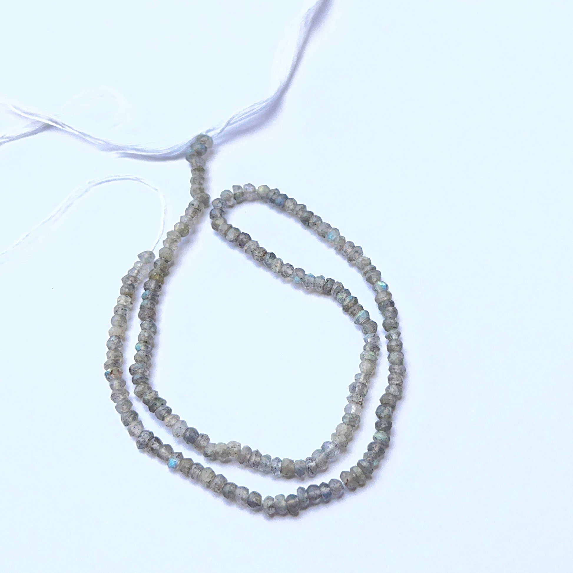 Labradorite faceted rondelle natural gemstone beads in 3.1–3.3mm on a 33cm strand, showing blue‑green flashes for DIY jewellery.