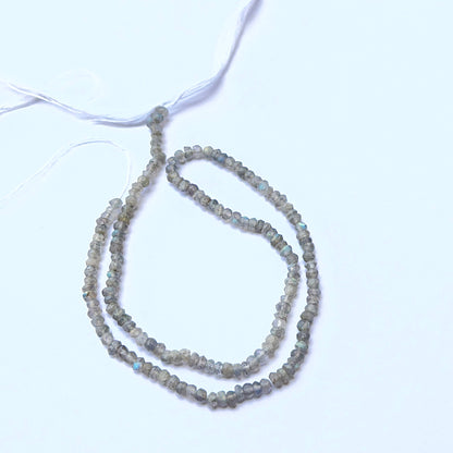 Labradorite faceted rondelle natural gemstone beads in 3.1–3.3mm on a 33cm strand, showing blue‑green flashes for DIY jewellery.