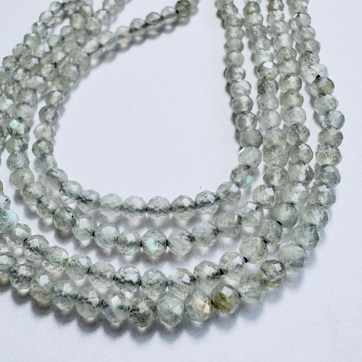 Stone beads in grey tones with 0.4mm holes, perfect for threading into custom jewellery and fashion accessories.