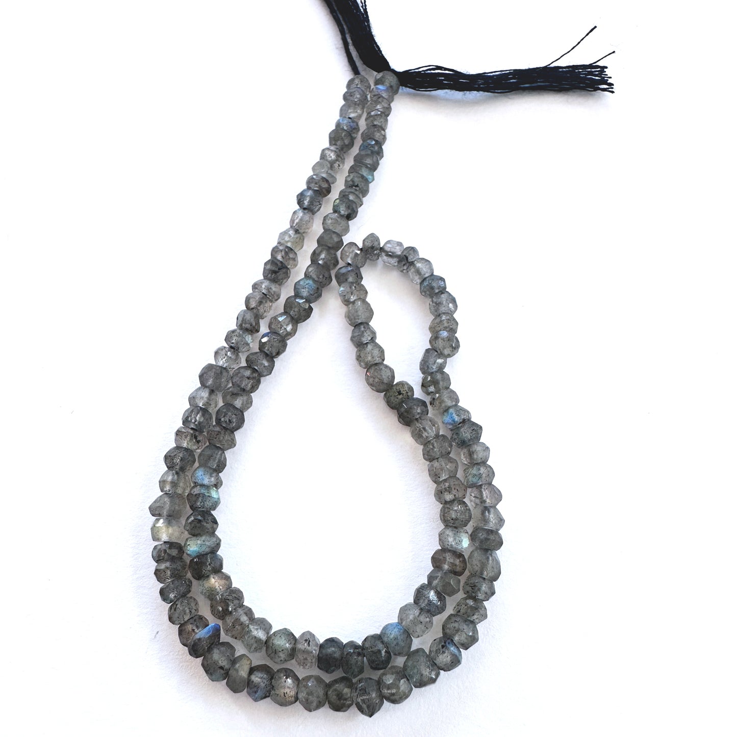 Stone Beads in Labradorite with refined faceted rondelle cut for handmade jewellery components.