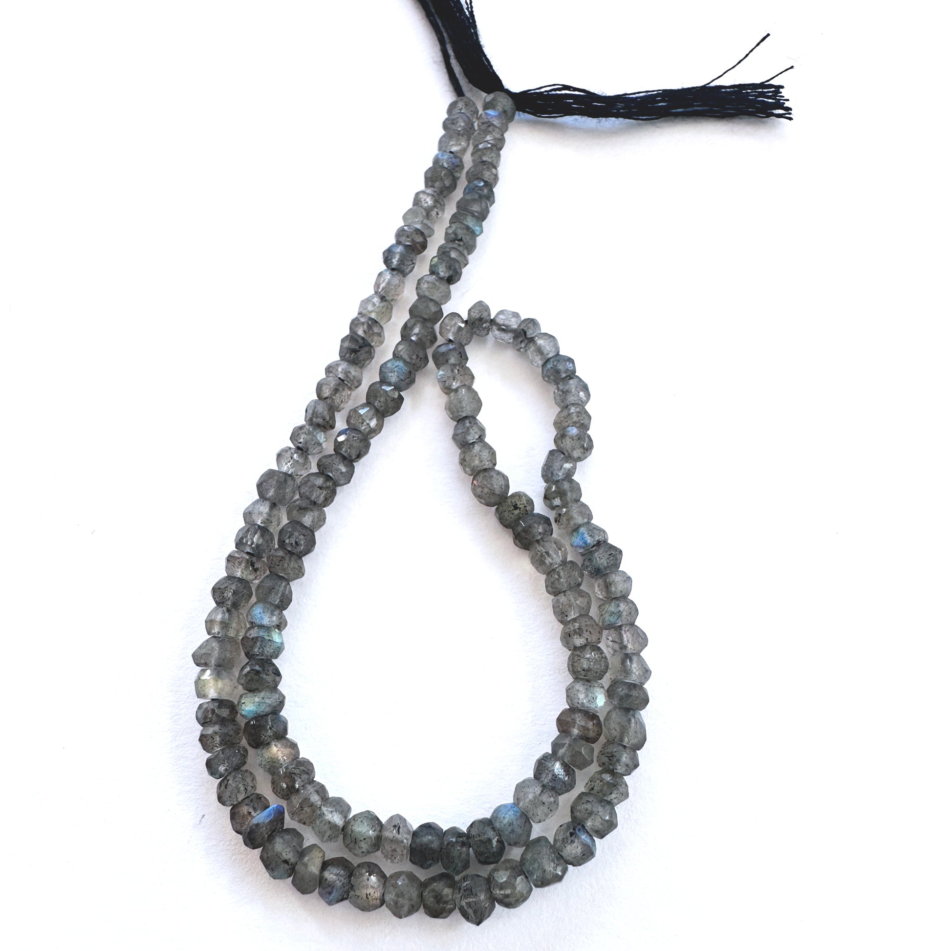 Stone Beads in Labradorite with refined faceted rondelle cut for handmade jewellery components.