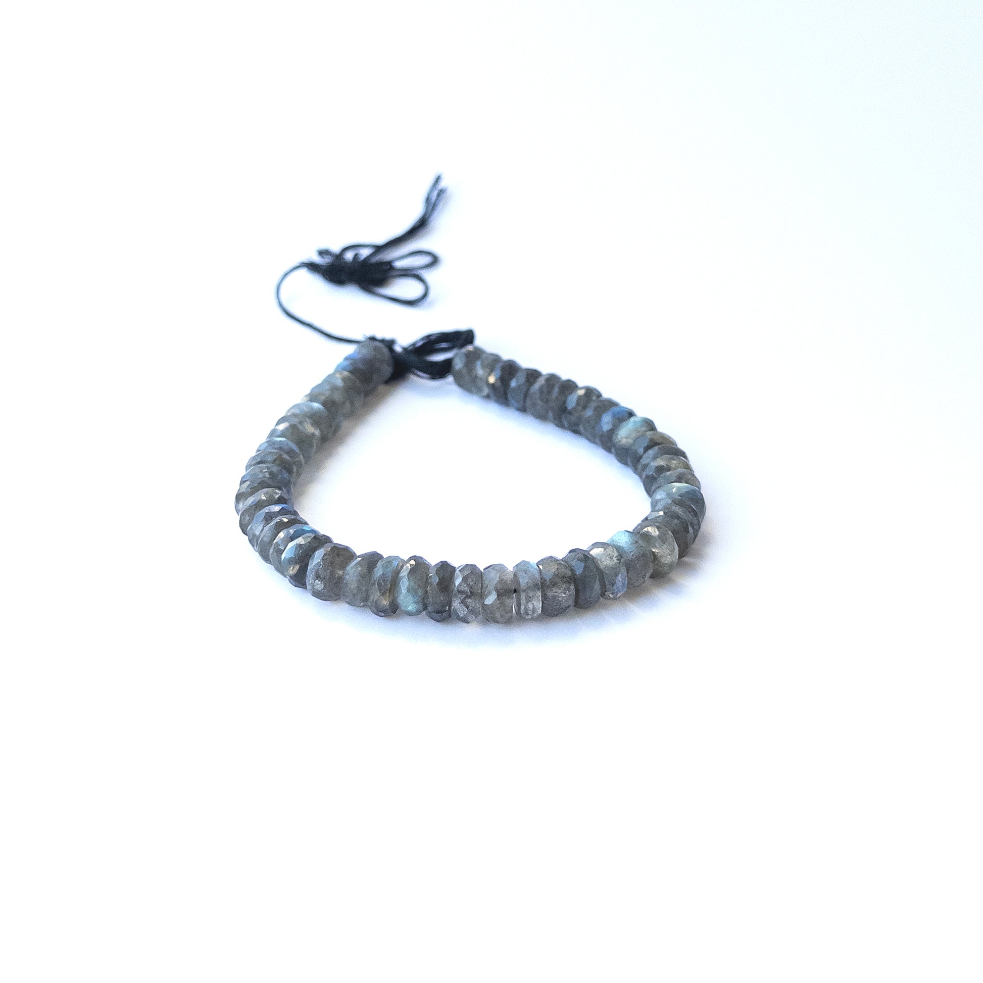 Strand of labradorite faceted rondelles displaying grey‑blue tones and quality cut for gemstone beads for DIY jewellery.