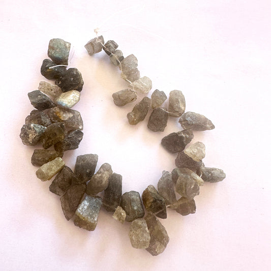 Labradorite rough beads with iridescent flashes and side-drilled 5.5–6mm size.