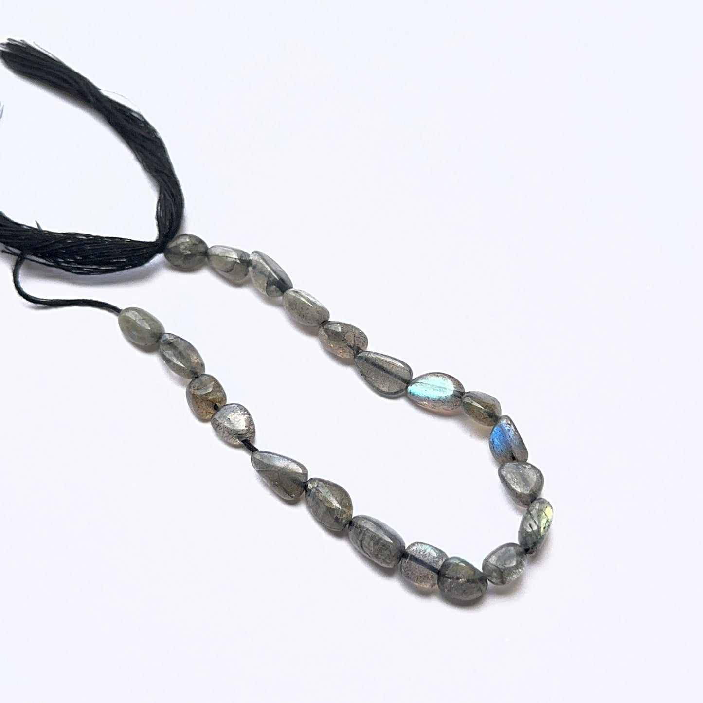 Labradorite tumbled natural gemstone beads in 5 to 5.6mm, showing blue‑green flashes for DIY jewellery.