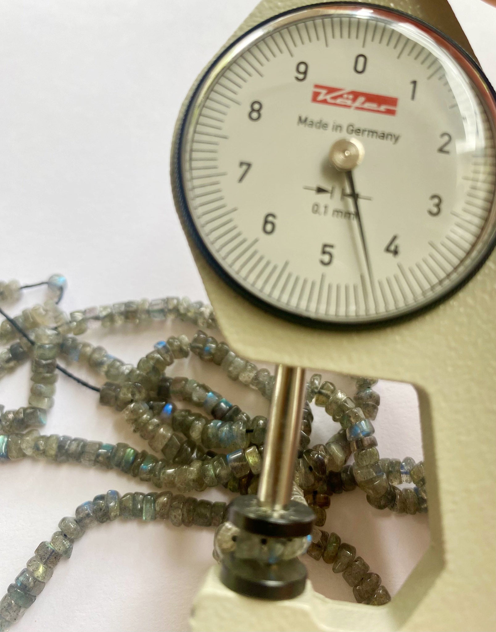 Perfectly matched 4.5-5mm Labradorite gemstone beads with a refined, smooth wheel cut.