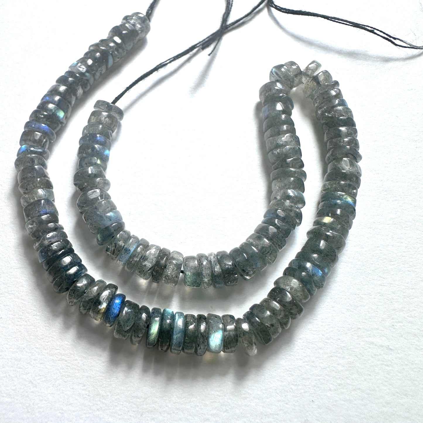 Handmade jewellery components with Labradorite beads arranged in a 20cm strand, ideal for elegant and versatile designs.