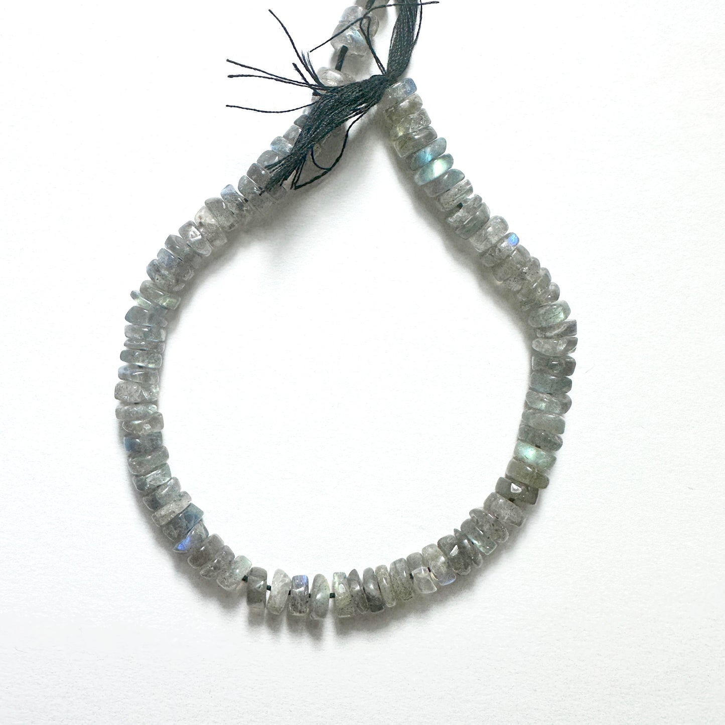 Handmade jewellery components with Labradorite beads arranged in a 21cm strand, ideal for elegant and versatile designs.