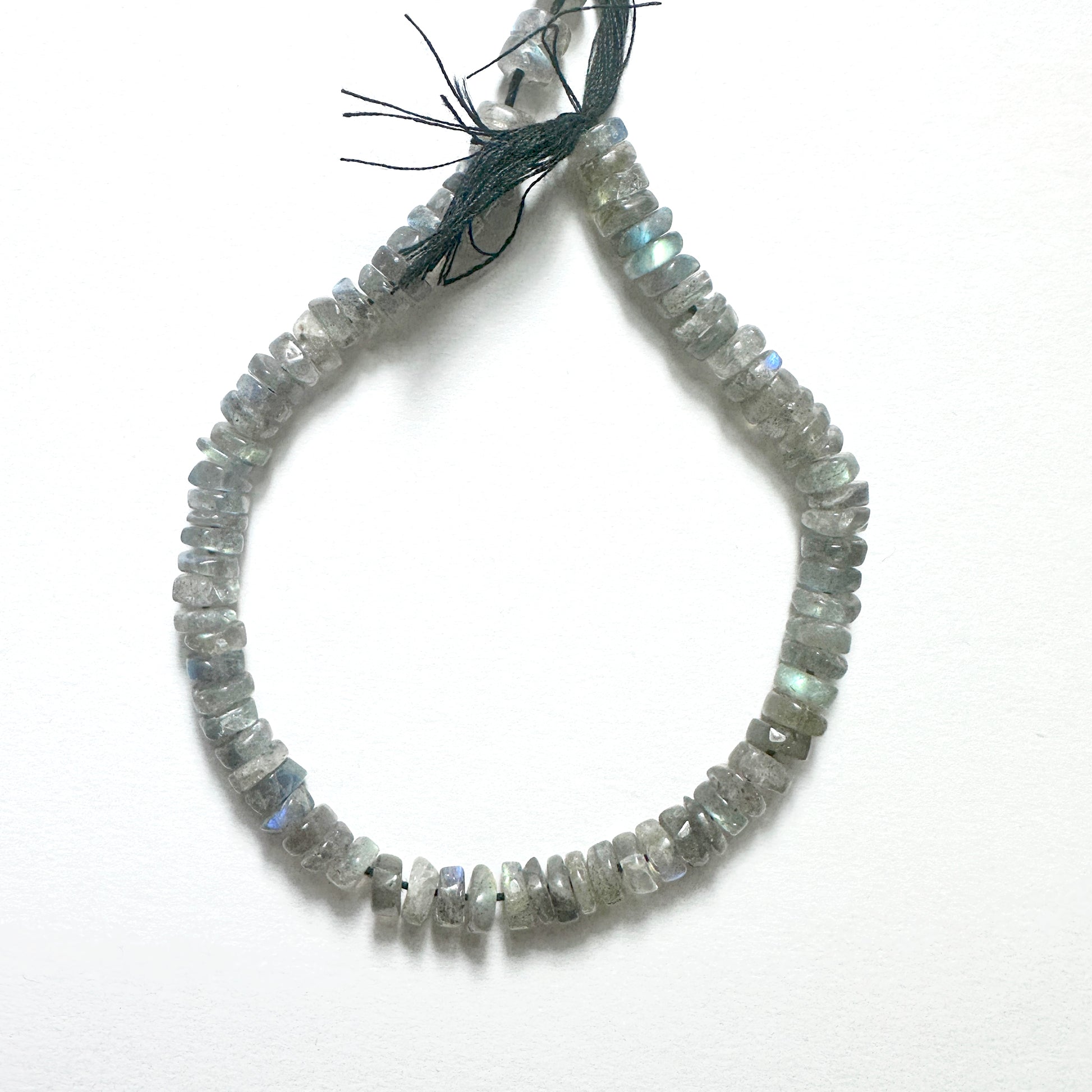 Handmade jewellery components with Labradorite beads arranged in a 21cm strand, ideal for elegant and versatile designs.