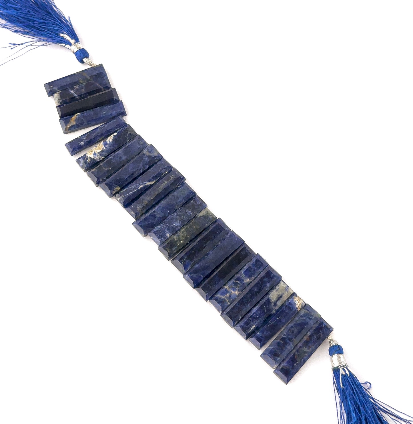 Lapis Lazuli rectangle beads featuring sharp facets, saturated blue colour, and consistent 6.5–7.5mm sizing.