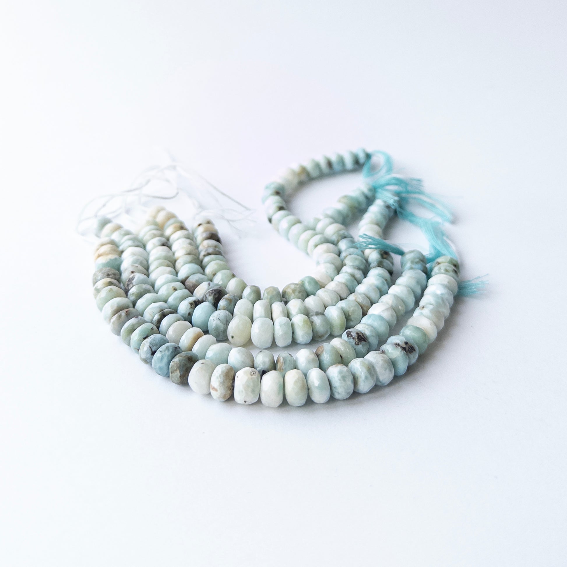 Larimar faceted rondelle beads in 7.3–8mm size on a 16cm strand, showcasing genuine gemstone sparkle for handmade jewellery.