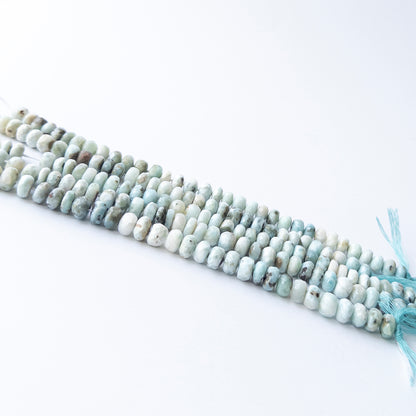 Authentic Larimar stone beads with faceted rondelle cut, ideal for DIY jewellery makers seeking premium gemstone components.