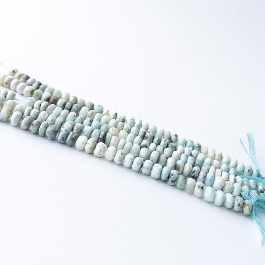 Authentic Larimar stone beads with faceted rondelle cut, ideal for DIY jewellery makers seeking premium gemstone components.