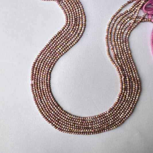 Lavender Opal faceted rondelle beads with 2.2mm size arranged in a shimmering 32cm strand.