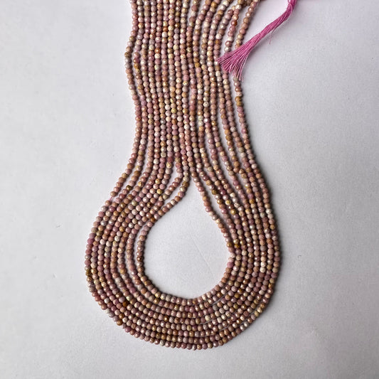 Lavender Opal rondelle beads with brilliant shine and precise faceting.