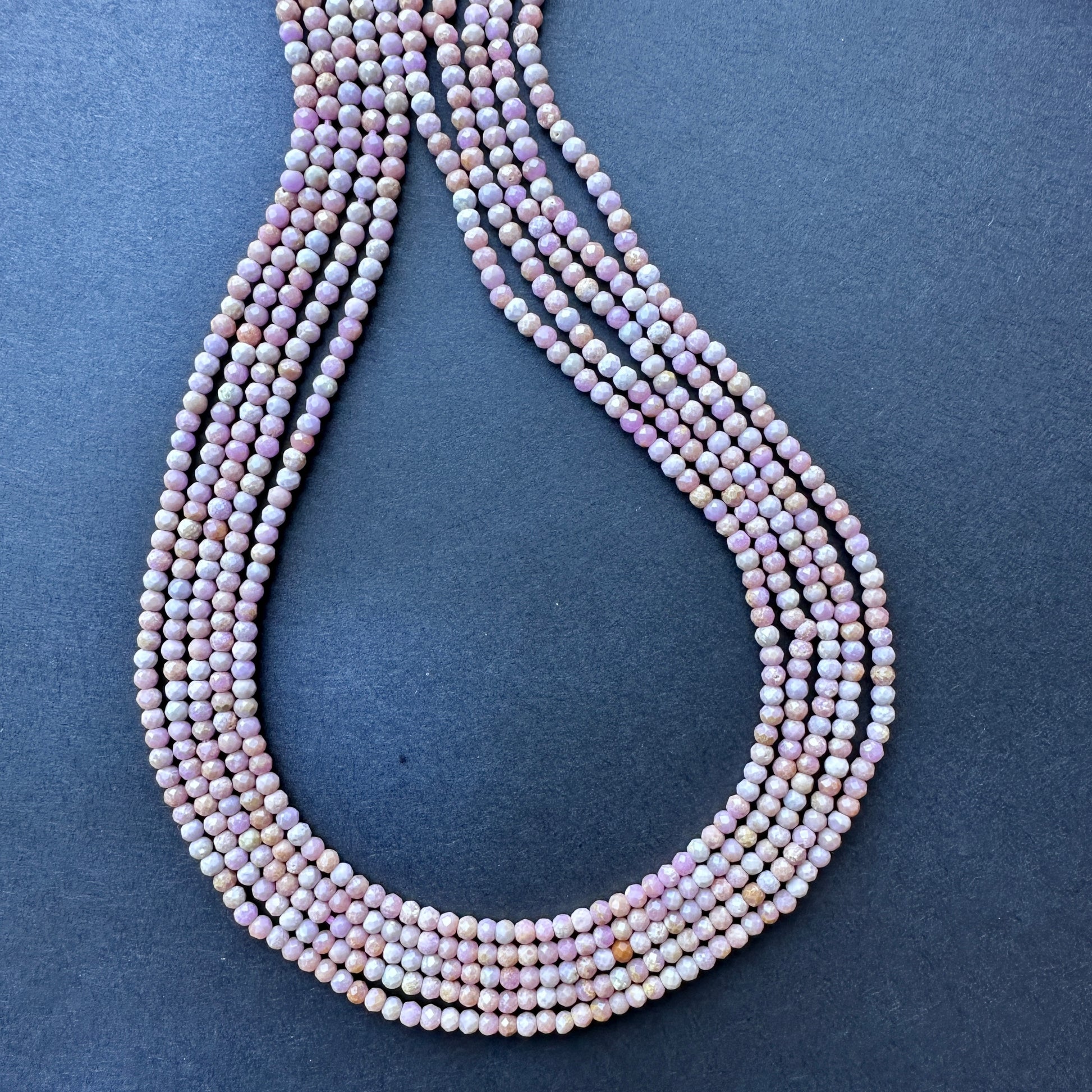 Natural Lavender Opal gemstone beads in faceted rondelle shape, perfect for elegant stone bead necklace designs.