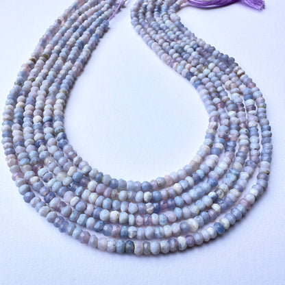 Lavender opal stone beads with faceted rondelle cut and soft pastel tones for elegant handmade jewellery components.