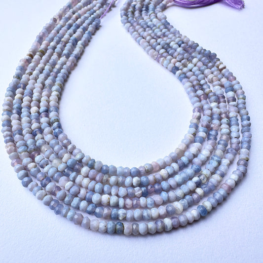 Lavender opal stone beads with faceted rondelle cut and soft pastel tones for elegant handmade jewellery components.
