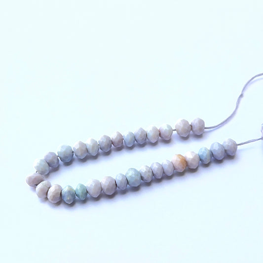 Close‑up of Peridot stone beads in chip cut, highlighting organic shapes for handmade jewellery components.