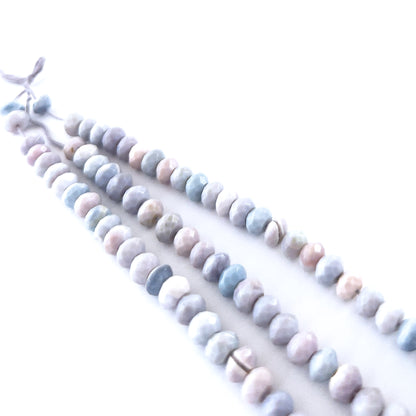 Genuine Lavender Opal faceted rondelle gemstones with pastel purple colour and polished brilliance in a short 15cm strand.