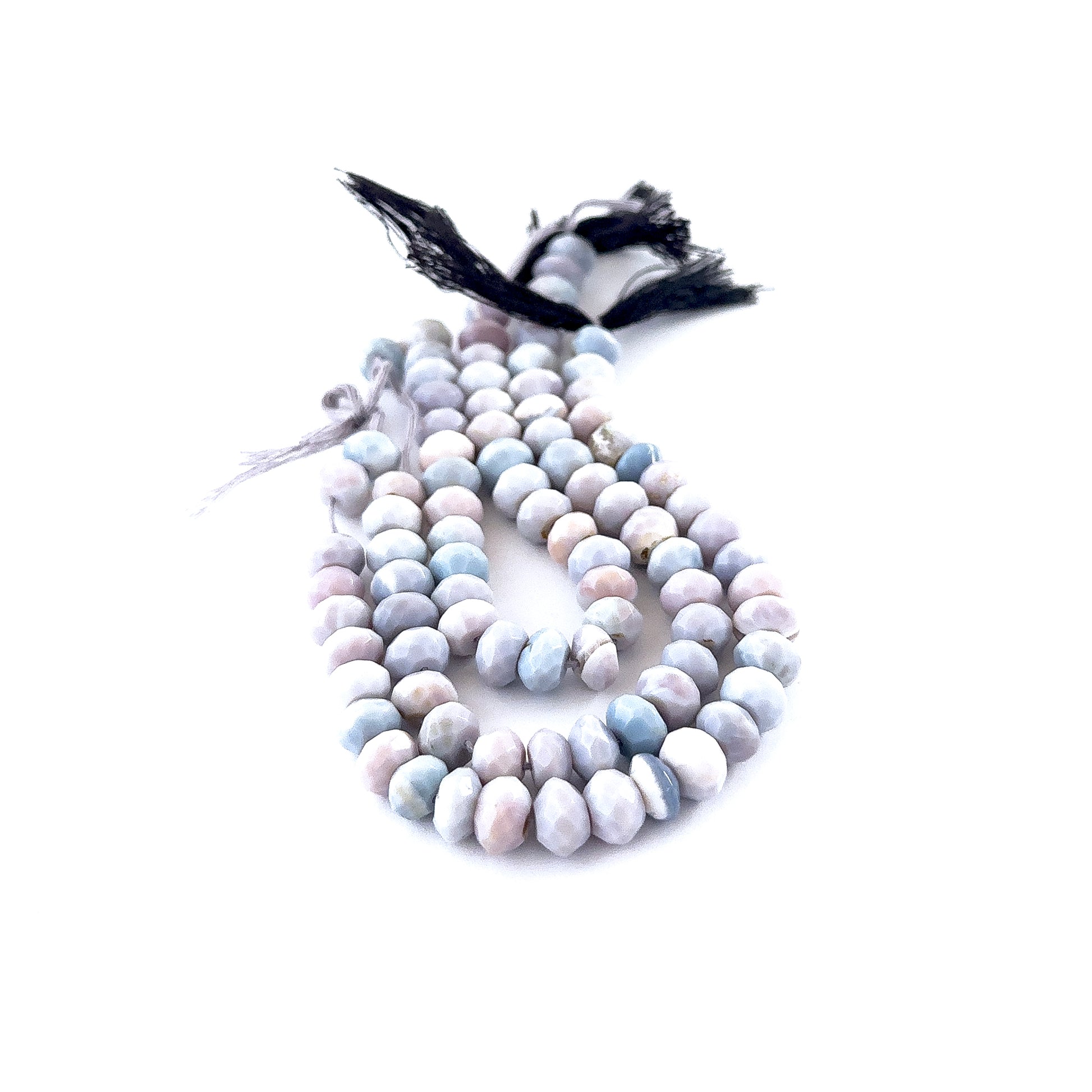 Lavender Opal faceted rondelle beads sized 7.5–8mm arranged in a 15cm strand, showing soft lavender tones and sparkling facets.