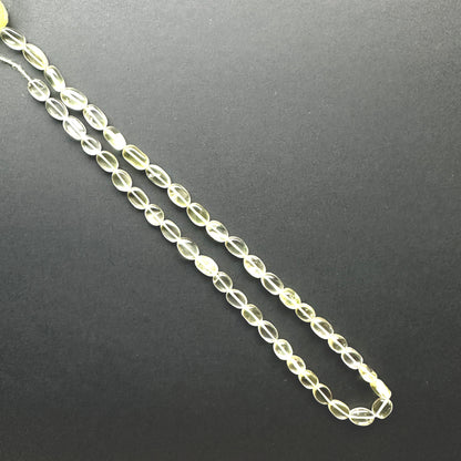 Handmade jewellery components made from Lemon Quartz beads with 0.5mm drilled holes.