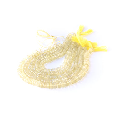 Lemon Quartz smooth wheel beads in 6–6.5mm size on a 20cm strand, showcasing genuine gemstone shine.