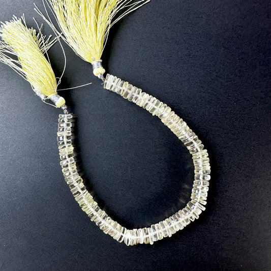 Natural gemstone beads featuring Lemon Quartz with a polished finish and consistent wheel cut.
