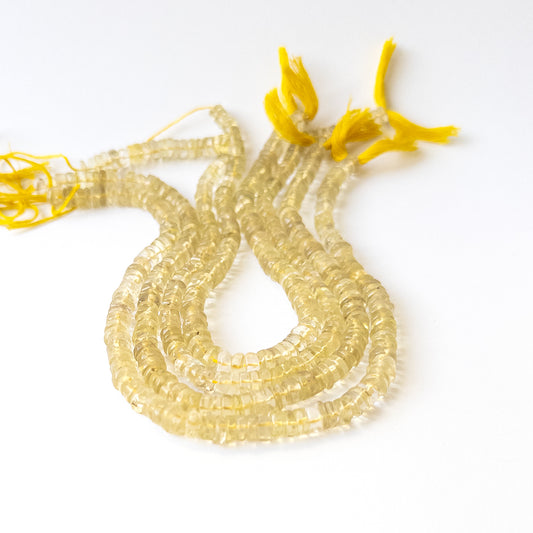 Authentic Lemon Quartz gemstone beads featuring polished smooth wheel cuts ideal for DIY jewellery making.