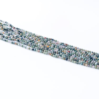 Handmade jewellery components featuring natural Mixed Agate faceted rondelles, highlighting their vibrant colours and bright shine.