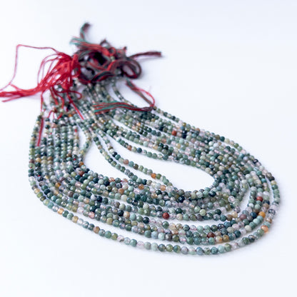 Close‑up of authentic Mixed Agate faceted rondelle beads showing their sparkle, clarity, and consistent 3.1mm sizing.