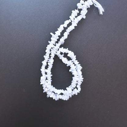 Handmade jewellery components made from 4-5mm Moonstone chips with 0.5mm drilled holes.