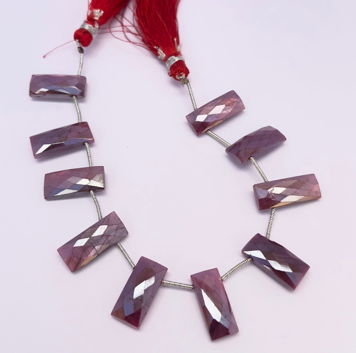 Moonstone Coated gemstone beads for jewellery making displayed with soft lighting and clarity.