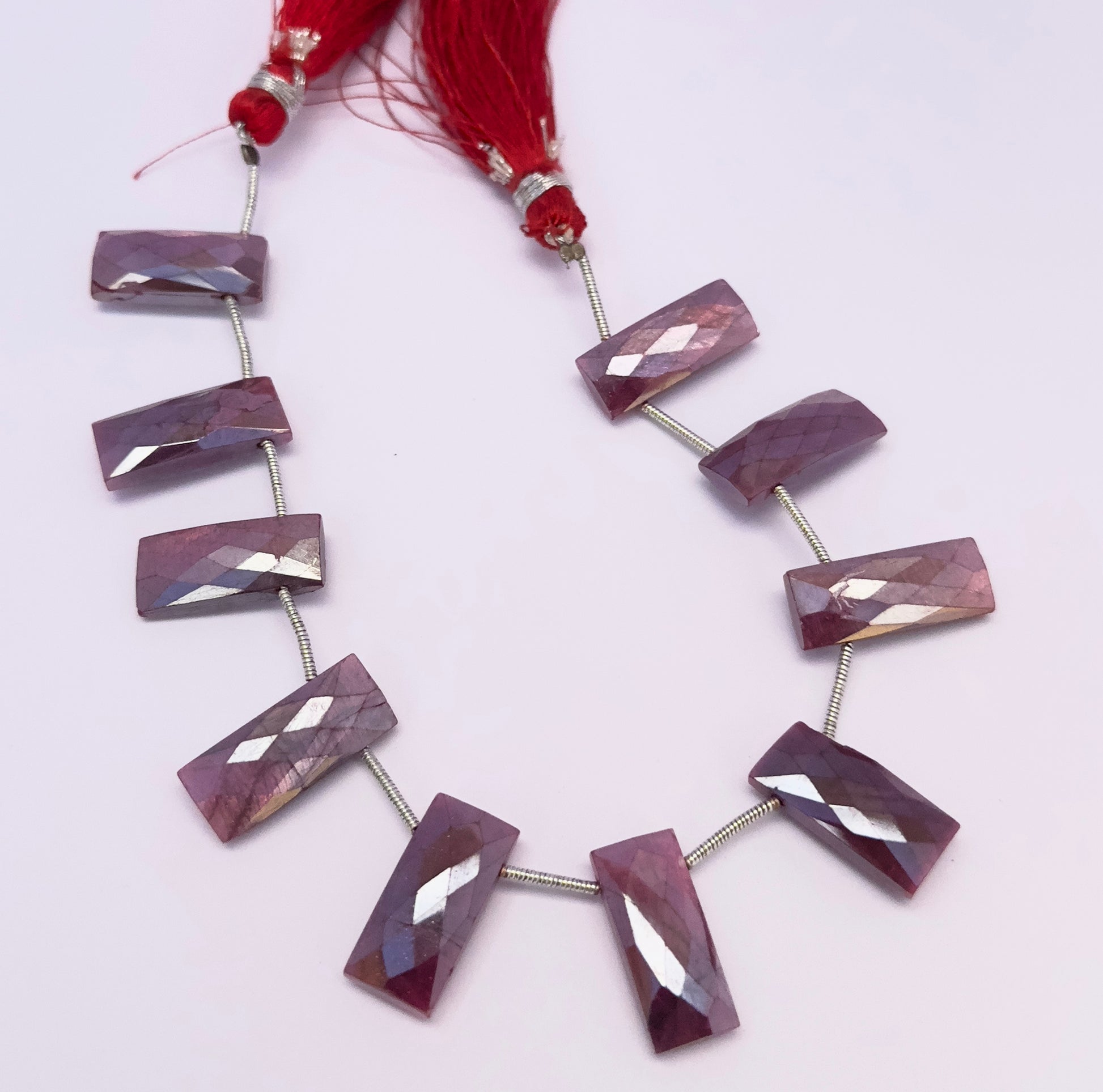 Moonstone Coated gemstone beads for jewellery making displayed with soft lighting and clarity.