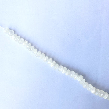 High-quality moonstone rondelles with 0.5mm bead holes and radiant shine.