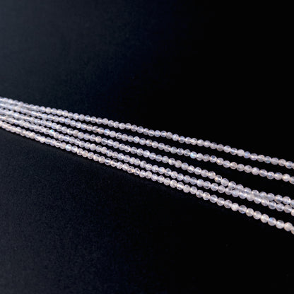 Handmade jewellery components featuring natural moonstone faceted rondelles with luminous tones and polished sparkle.