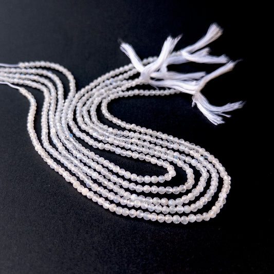 Authentic moonstone gemstone beads with polished faceted rondelle cuts, ideal for handmade jewellery components.