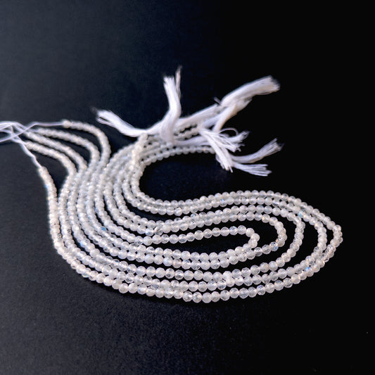 Genuine stone beads with soft white and rainbow flashes, featuring faceted rondelles for DIY jewellery making.