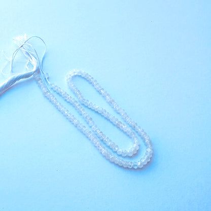 Detailed view of premium Moonstone stone beads showing consistent 3.8mm sizing, faceting and luminous colour.