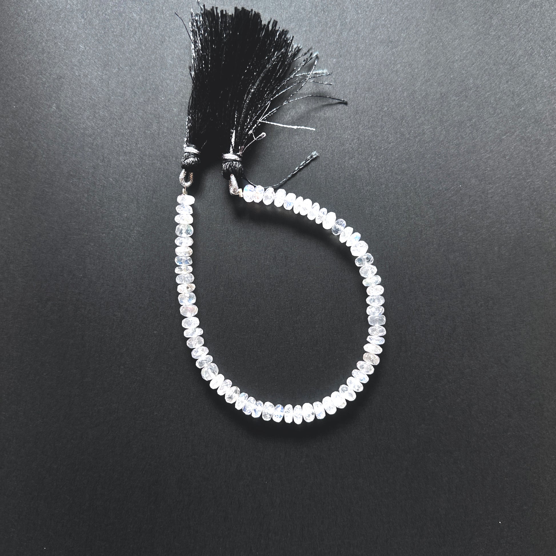 Natural gemstone beads for jewellery, highlighting the unique glow of Moonstone stones.