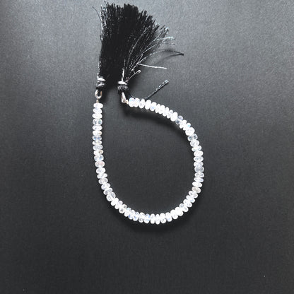 Natural gemstone beads for jewellery, highlighting the unique glow of Moonstone stones.