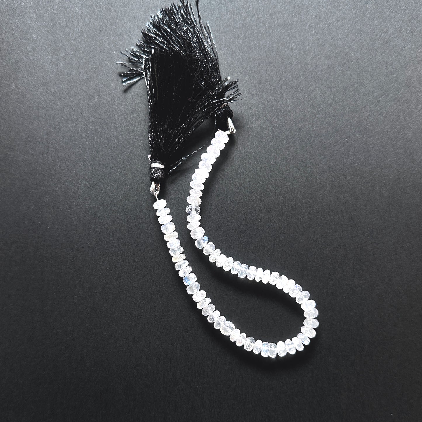 Natural gemstone beads featuring Moonstone with precision faceting and soft iridescent glow.