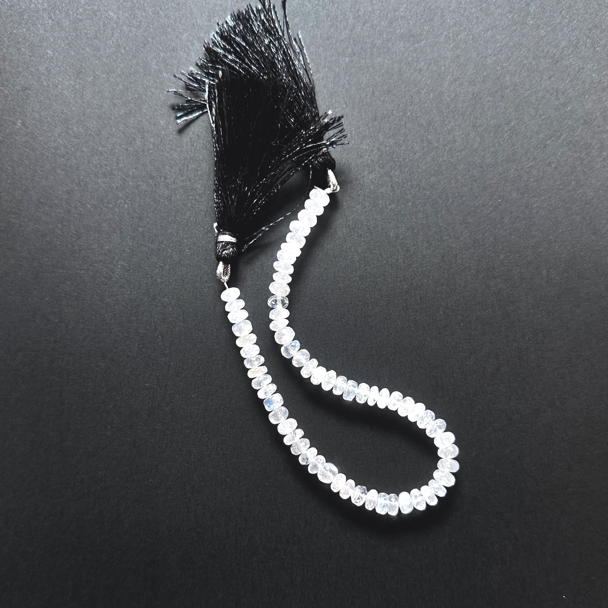 Natural gemstone beads featuring Moonstone with precision faceting and soft iridescent glow.