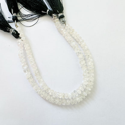 Moonstone rondelle beads in 6.3–6.5mm size with soft glow and faceted precision on a 20cm strand.