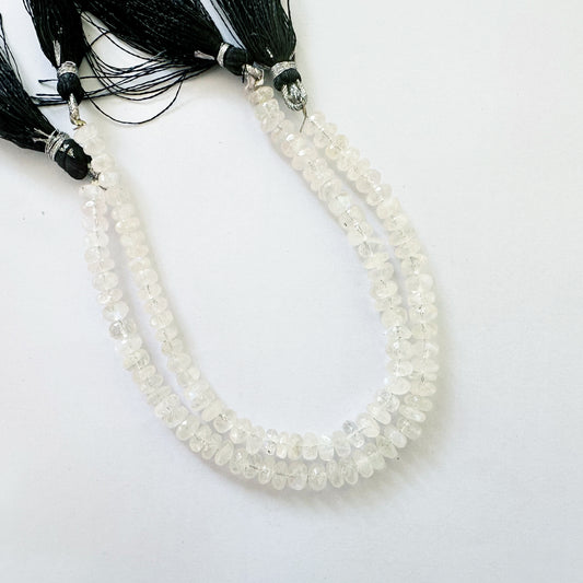 Moonstone rondelle beads in 6.3–6.5mm size with soft glow and faceted precision on a 20cm strand.