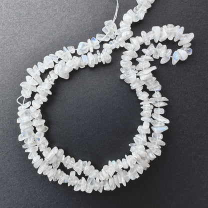 Moonstone stone beads with smooth chip cut and polished surface.