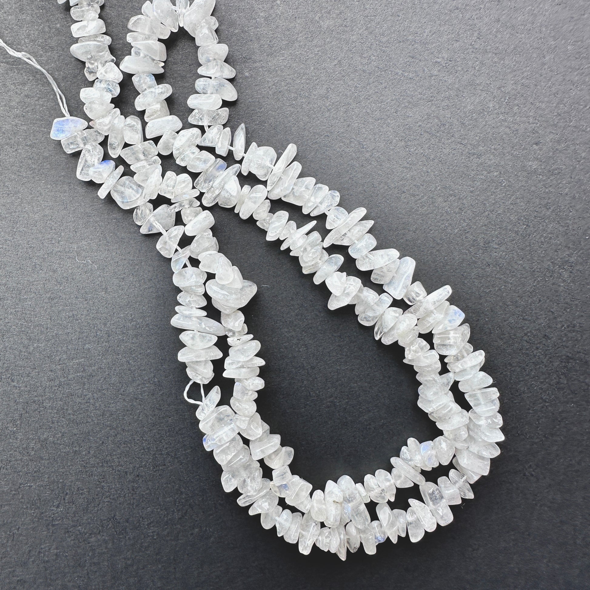 Natural gemstone beads in Moonstone, arranged on a 44cm strand with organic shapes.