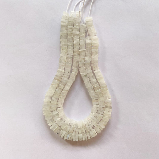 Close-up of smooth Moonstone square beads showing 5–5.5mm and 6–6.5mm sizes.