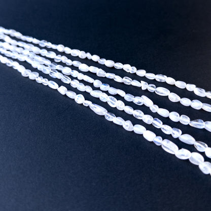 High‑quality moonstone tumble gemstone beads with gentle shine and natural adularescence on a long strand.