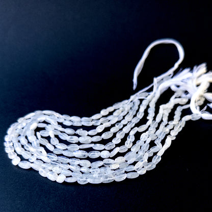 High‑quality moonstone tumble gemstone beads with gentle shine and natural adularescence on a long strand.