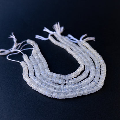 High‑quality moonstone wheel gemstone beads with gentle shine and natural adularescence on a short strand.